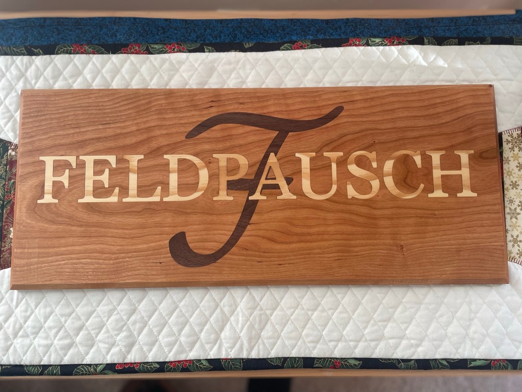 Cherry walnut pine family inlay sign