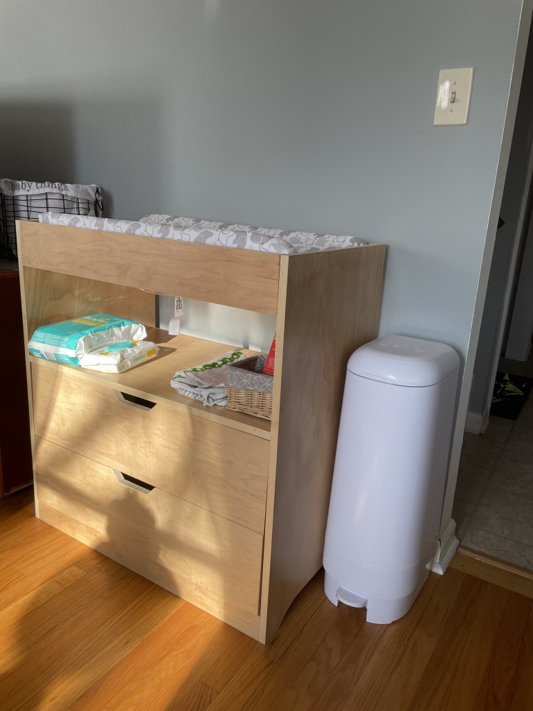 Maple plywood changing table with changing pad